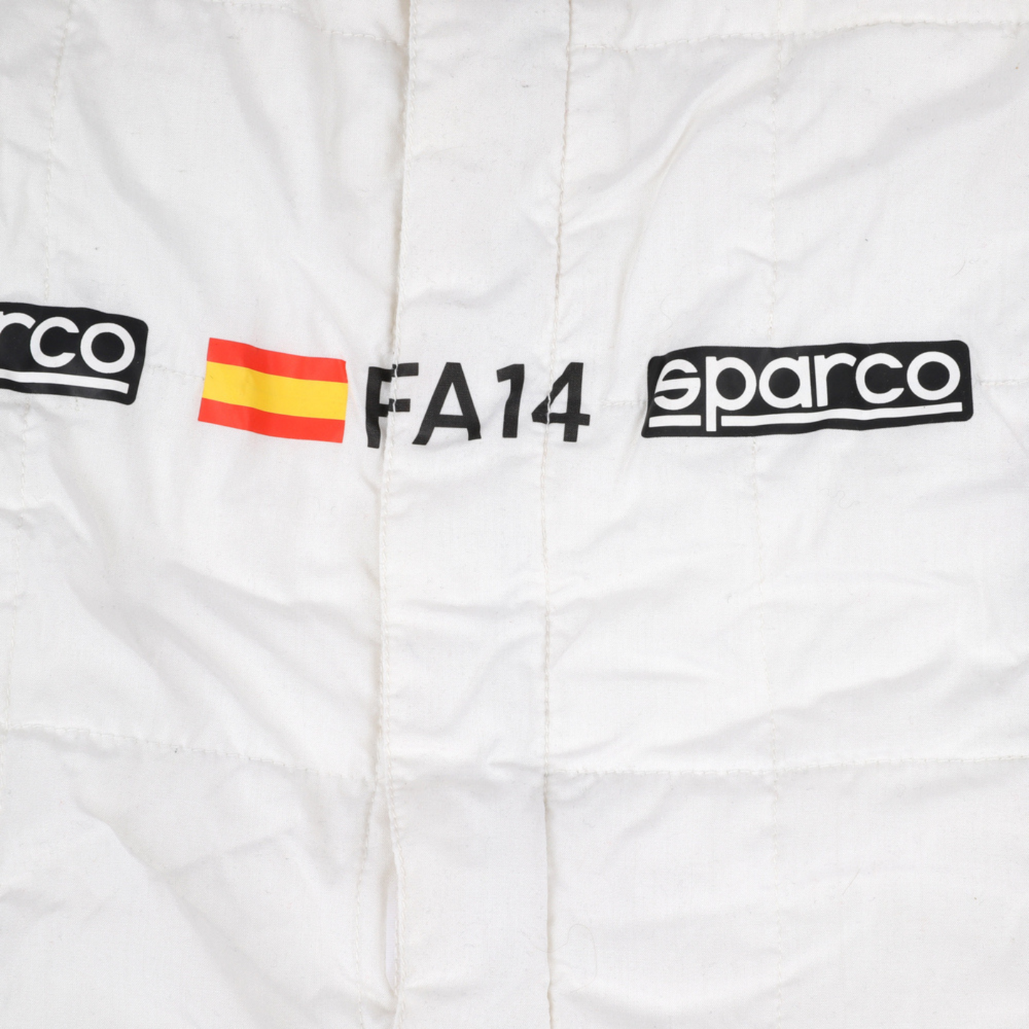 Waist view of Fernando Alonso’s 2018 F1 racing suit, featuring adjustable waist and sponsor logos, ensuring a secure and comfortable fit during racing events.