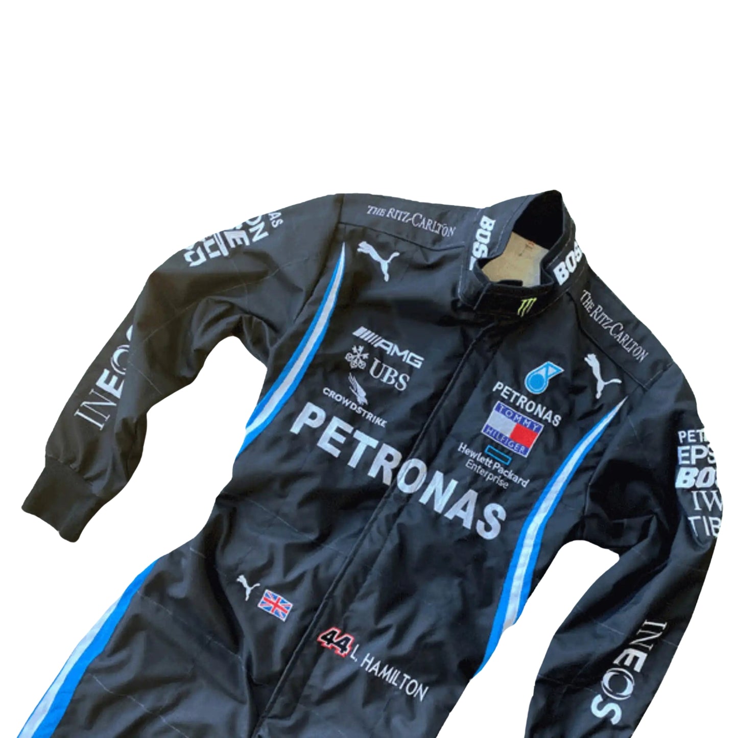 Close-up of Lewis Hamilton’s 2020 F1 suit revealing black fabric with turquoise stitching and sponsor details, worn during his legendary seventh title run.