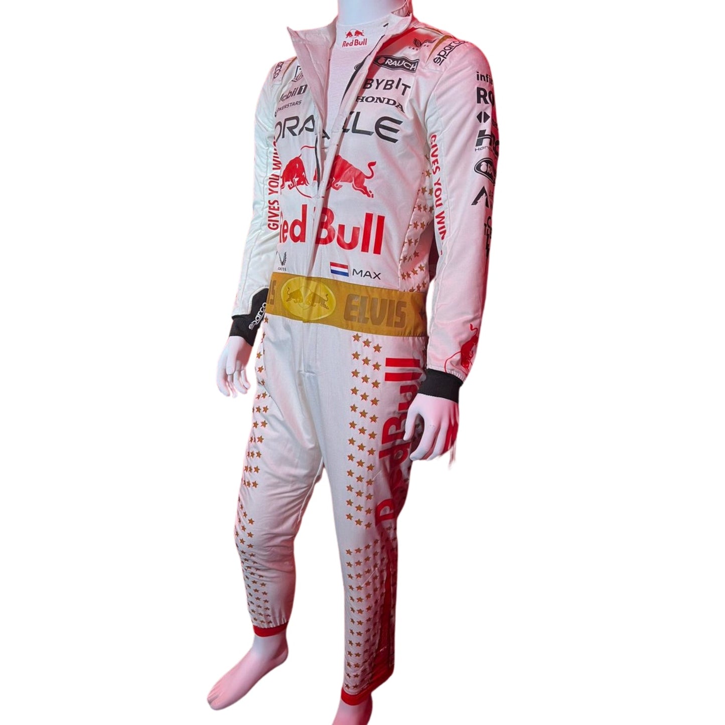 Max Verstappen in the 2023 Las Vegas GP racing suit featuring a crisp white base with gold star embellishments, red accents, and a signature Elvis-style belt.