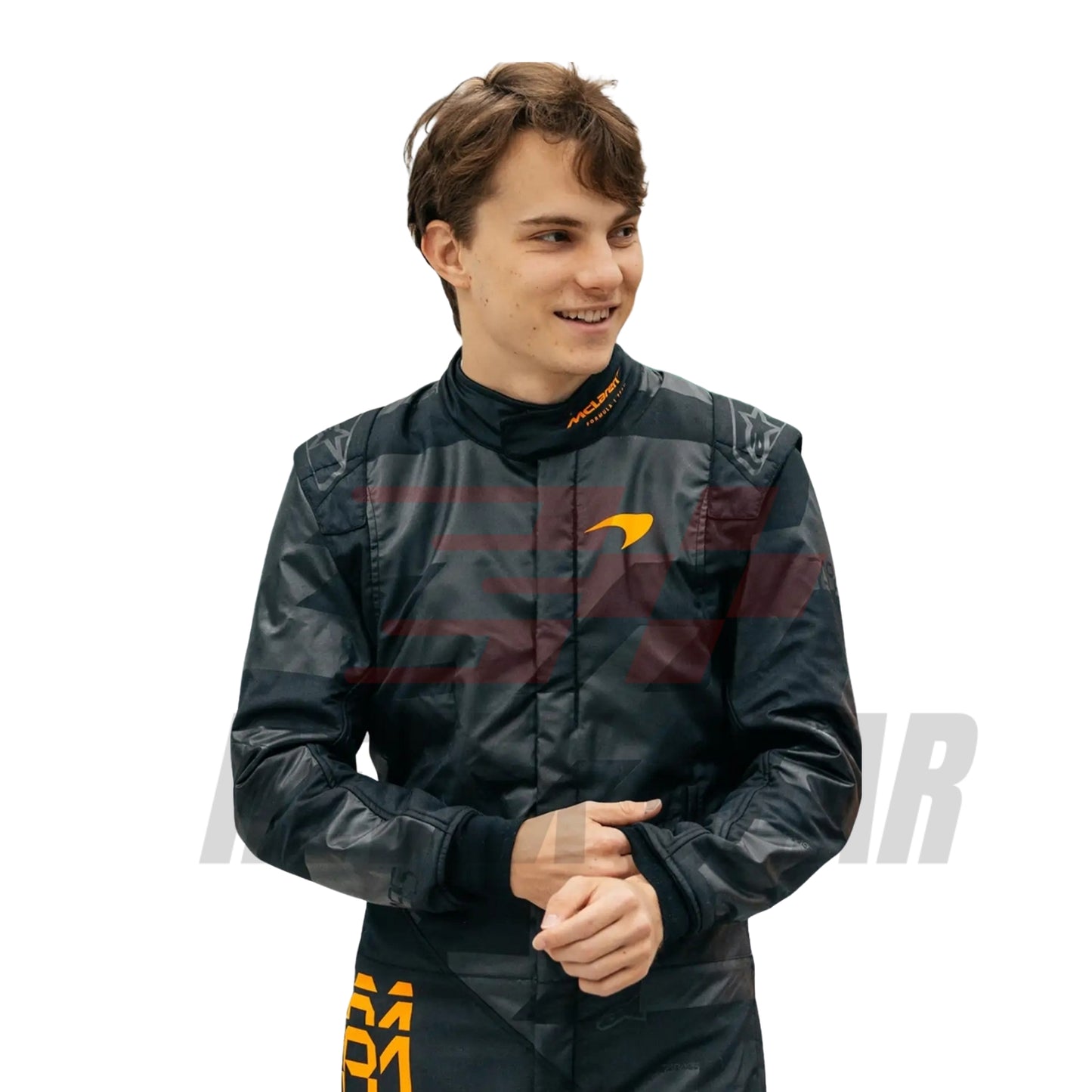 Close-up of Piastri with a —contrasting the matte black suit.