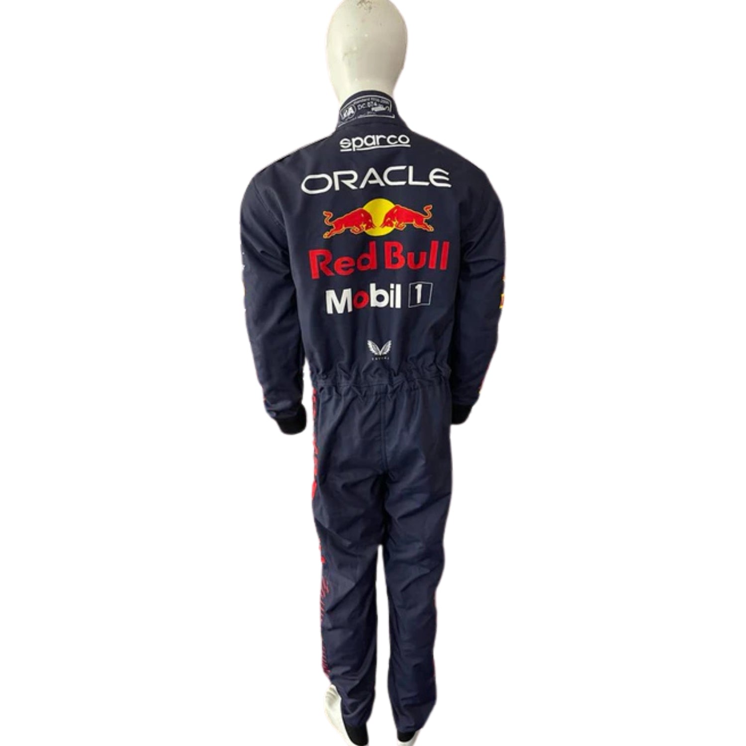 Rear view of the suit with dynamic shaping, navy blue dominance, red side stripes, and visible sponsor placement with precision stitching.