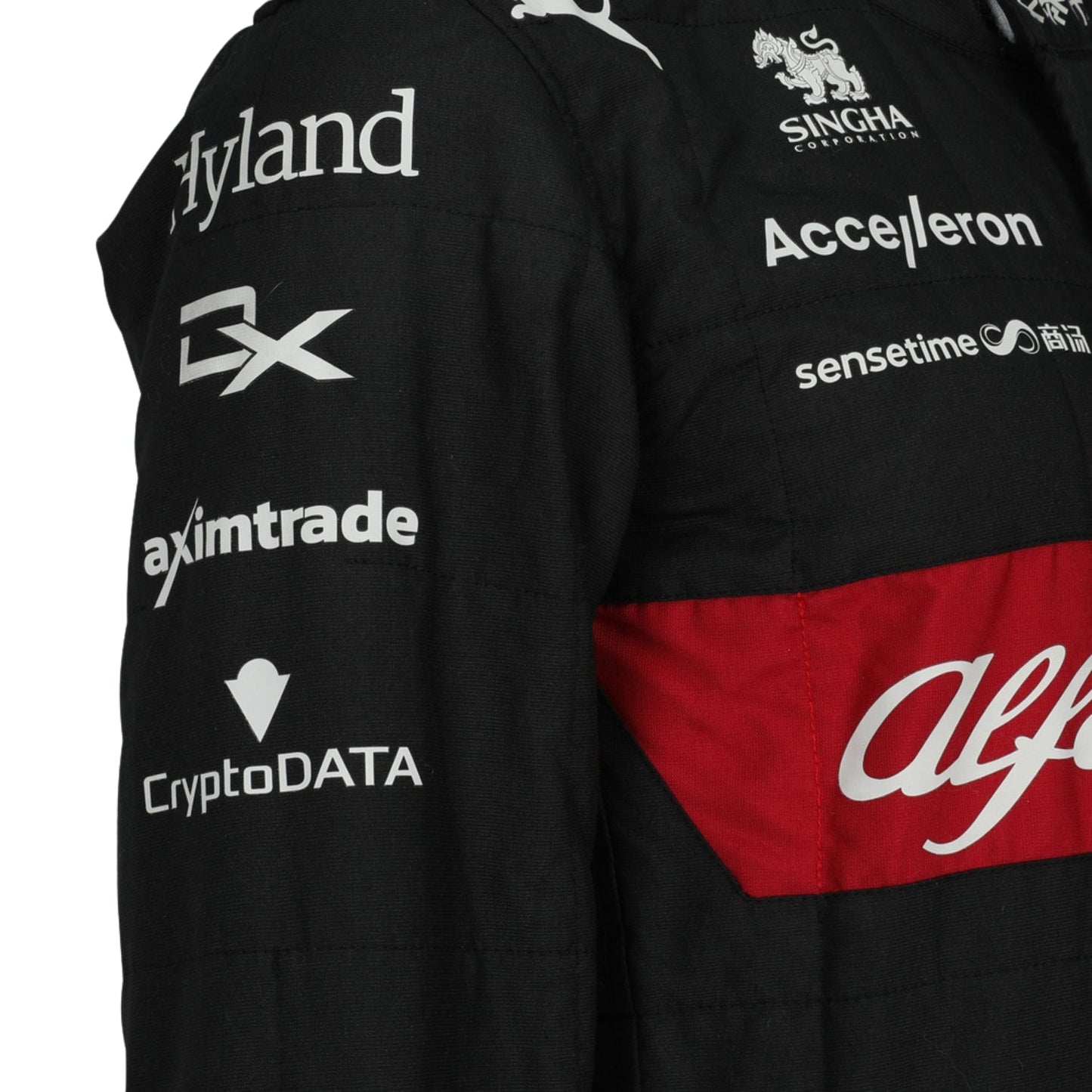Close-up of Bottas' 2023 Japanese Grand Prix F1 racing suit fabric texture and stitched sponsor logos, detailing the high-quality materials and the integration of the black, red, and white color palette.