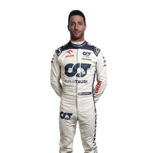 Close-up of Ricciardo’s 2023 F1 racing suit fabric texture and stitched sponsor logos, detailing the high-quality materials and the integration of the white, navy blue, and red color palette.