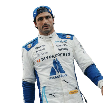 Close Up View of Carlos wearing a racing suit with various sponsor logos on a white background