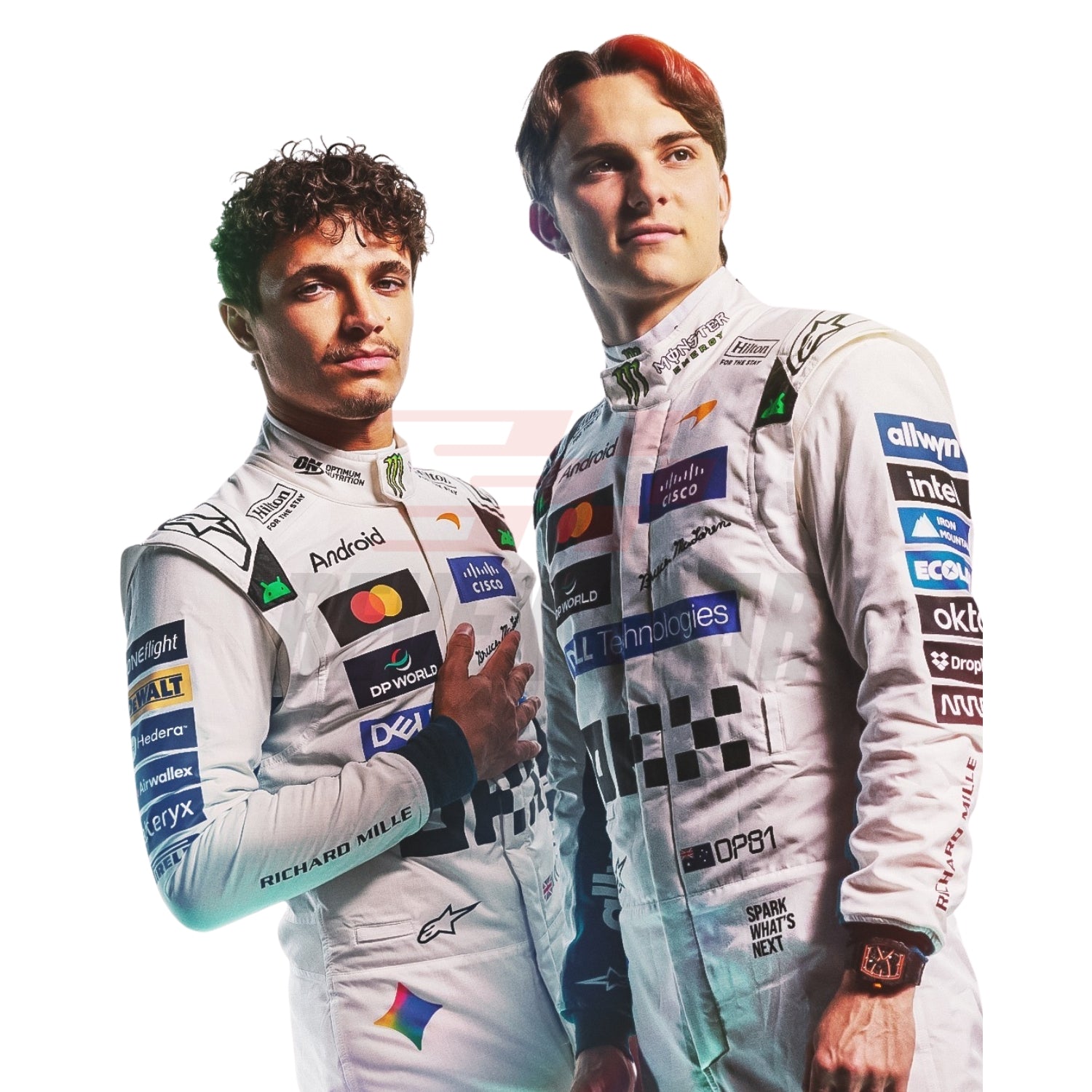 Close up View of Two race drivers Oscar Piastri and Lando Norris in white 2026 McLaren Bristish GP f1 racing suits with sponsor logos, standing against a white background. The suits feature prominent patches and branding including Castore, Alpinestars, and DPPI.