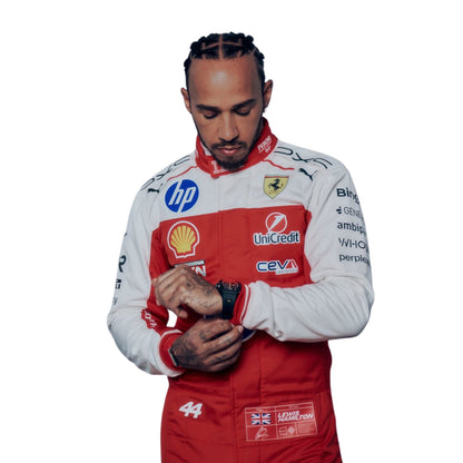   Lewis Hamilton wearing a 2026 USGP Ferrari F1 racing suit with various sponsor logos - Revex Gear