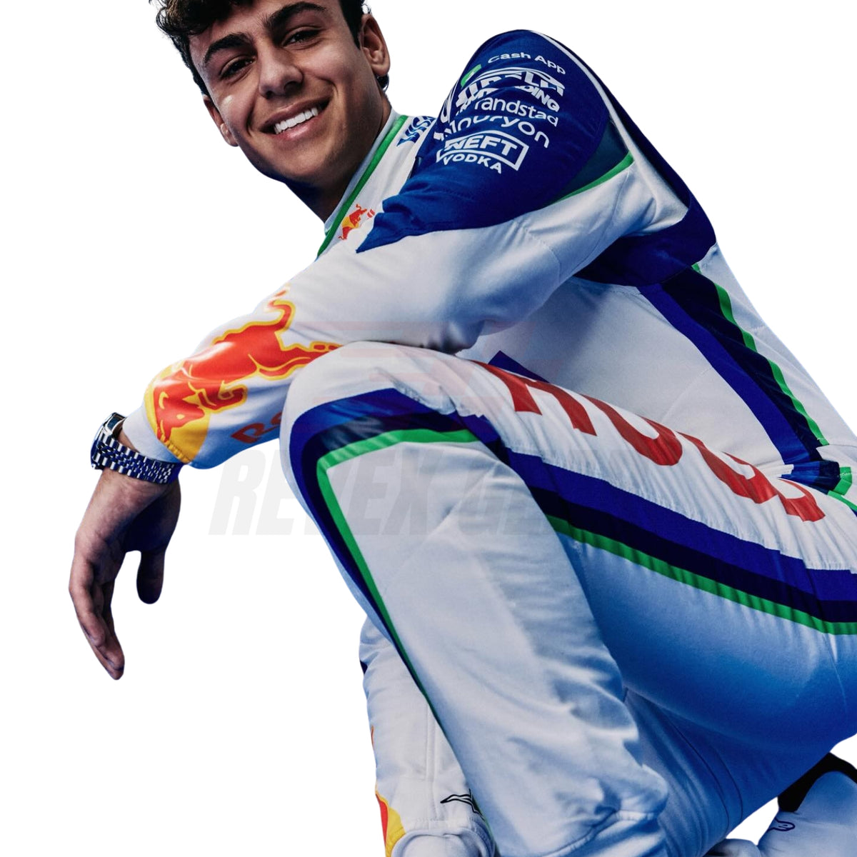 Arvid Lindblad wearing a colorful racing suit with various brand logos on a white background