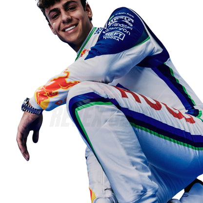 Arvid Lindblad wearing a colorful racing suit with various brand logos on a white background