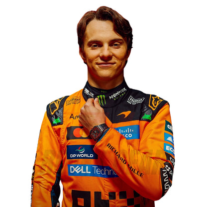 Close up detail of Oscar Piastri 2026 racing suit showing chest and shoulder patches - Revex Gear