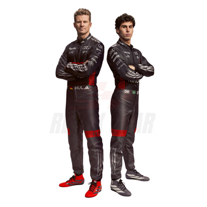 Gabriel Bortoleto Nico Hulkenberg wearing black racing suits with red accents on a white background