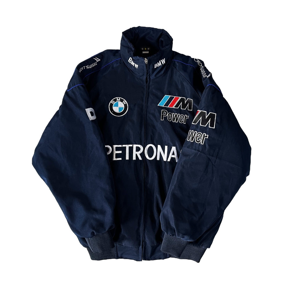 Front view of a BMW Sauber Vintage Racing Jacket with embroidered BMW Sauber logos and racing sponsor patches. Crafted from premium fabric, this jacket combines classic motorsport style with comfortable, durable material, ideal for fans of vintage racing.