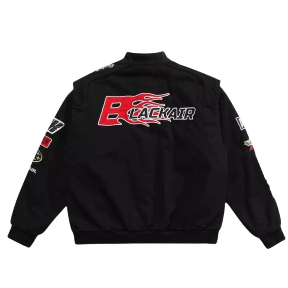 Back view of a Blackair Vintage Racing Jacket showcasing bold logo embroidery against the black background. The retro style and robust construction reflect the classic appeal and durability of vintage racing gear.