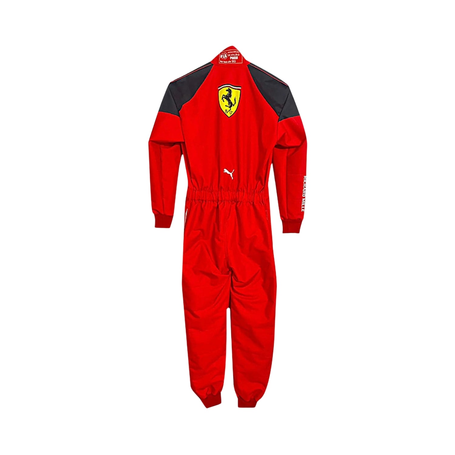  Rear view of Leclerc’s 2023 racing suit displaying the continuation of the Rosso Le Mans red and black color scheme with prominently placed sponsor logos and aerodynamic paneling.