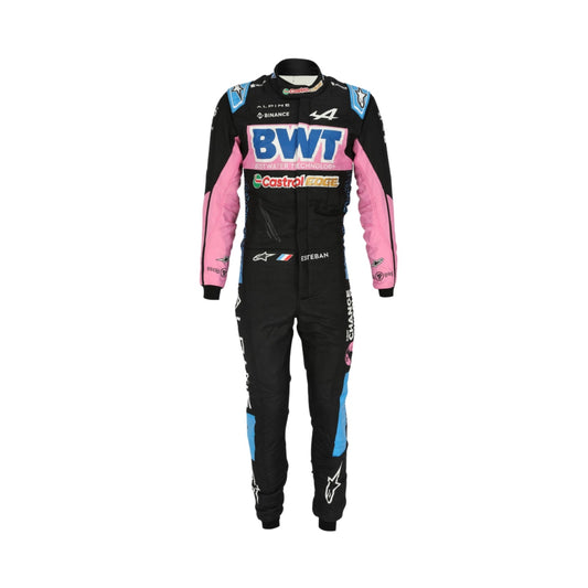 Esteban Ocon's 2023 Las Vegas Grand Prix F1 racing suit front view featuring a black base with pink and blue accents on the shoulders and sides, complemented by sponsor logos, showcasing a sleek and modern design.