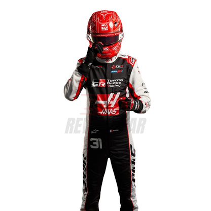 Esteban Ocon In 2026 F1 Racing Suit Wearing Helmet