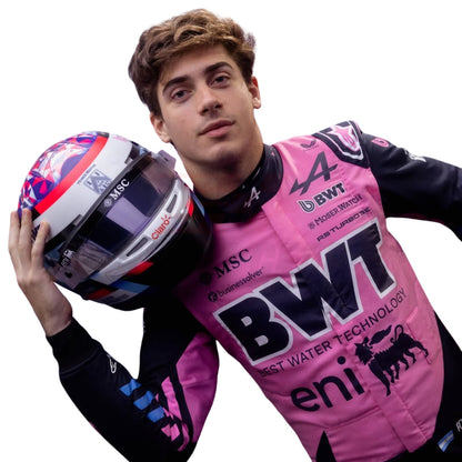 Franco Colapinto In 2026 F1 Racing Suit holding a helmet.