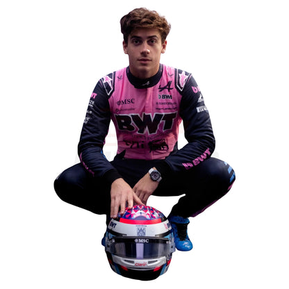 Franco Colapinto posing for a picture with a helmet in 2026 F1 Racing Suit 