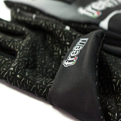 Close-up of black Freem Jecko Racing gloves with 'freem' branding on a white background