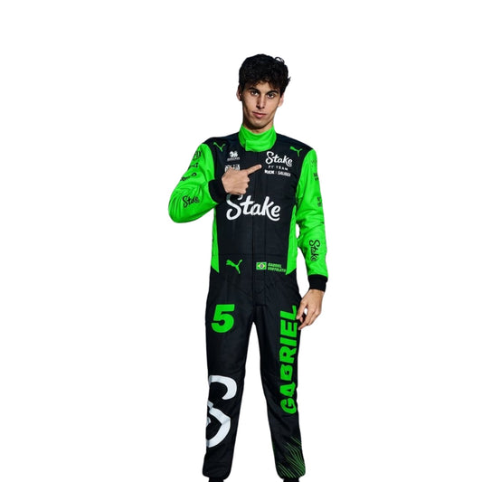 Gabriel Bortoleto standing in his 2025 racing suit, showing off the professional fit and bold design.

