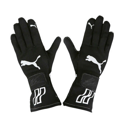 Pair of black Helio Castroneves 2017/18 IndyCar IMSA racing gloves with Puma logo on a white background
