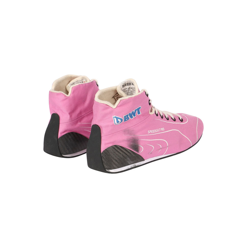 Pink Lance Stroll 2020 F1 racing shoes with black soles on a white background