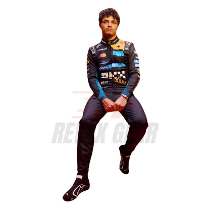 Sitting View of Lando Norris wearing a McLaren Monaco GP F1 racing suit with various sponsor logos - Revex Gear