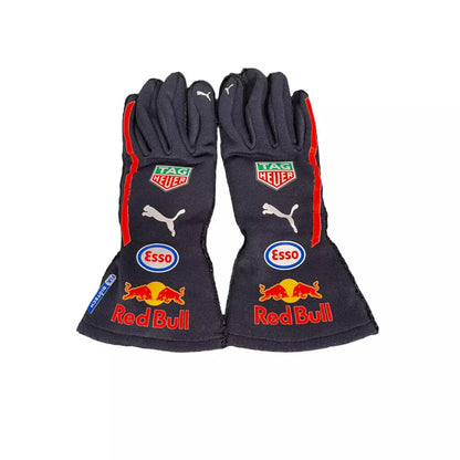 Pair of  Max Verstappen 2020 F1 racing gloves with Red Bull and Puma logos on a white background