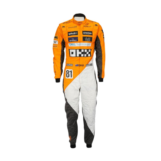  Oscar Piastri's 2023 Spanish GP racing suit featuring the striking ‘Triple Crown’ design with detailed branding and a vibrant visual aesthetic.