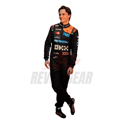 Front View of Oscar Piastri wearing a McLaren Monaco GP F1 racing suit with various sponsor logos - Revex Gear