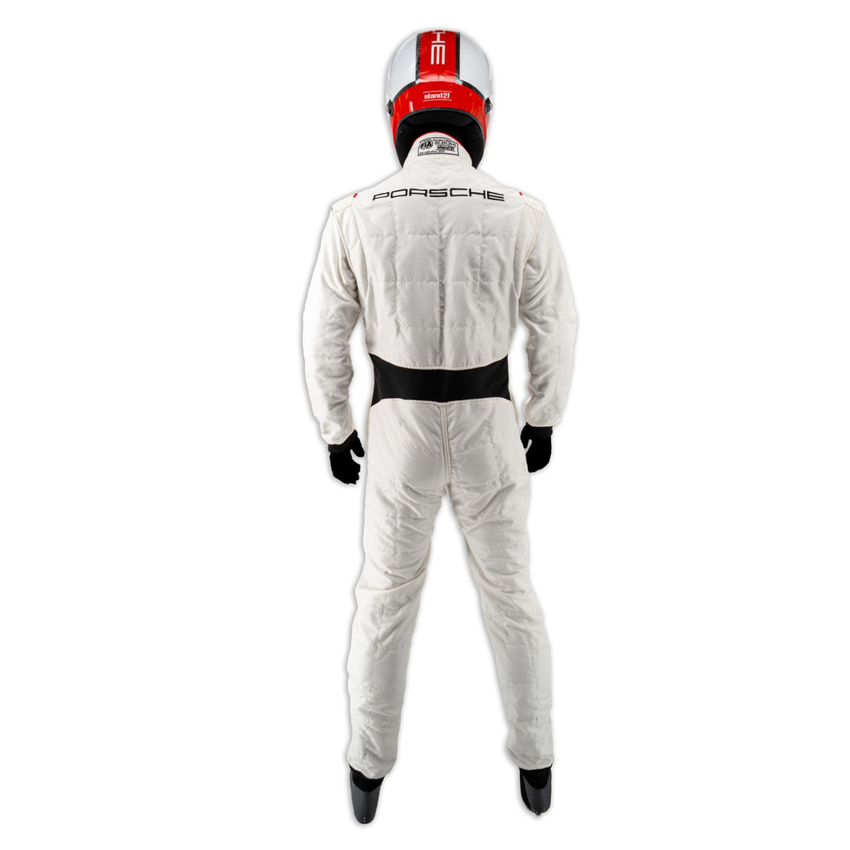 White Porsche Motorsport racing suit with red and black stripes, shown on a model wearing a white racing helmet and gloves