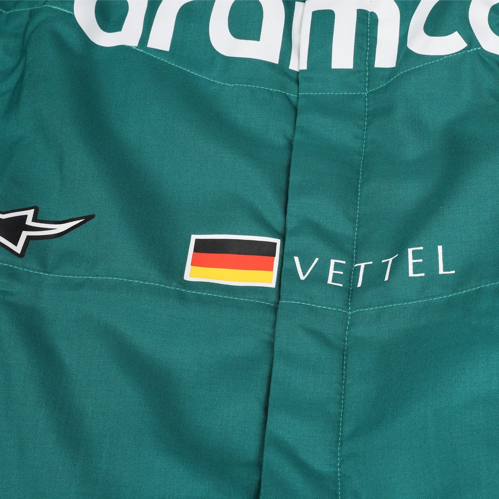Close-up of the upper torso of Sebastian Vettel's 2022 racing suit, featuring British racing green fabric with lime detailing