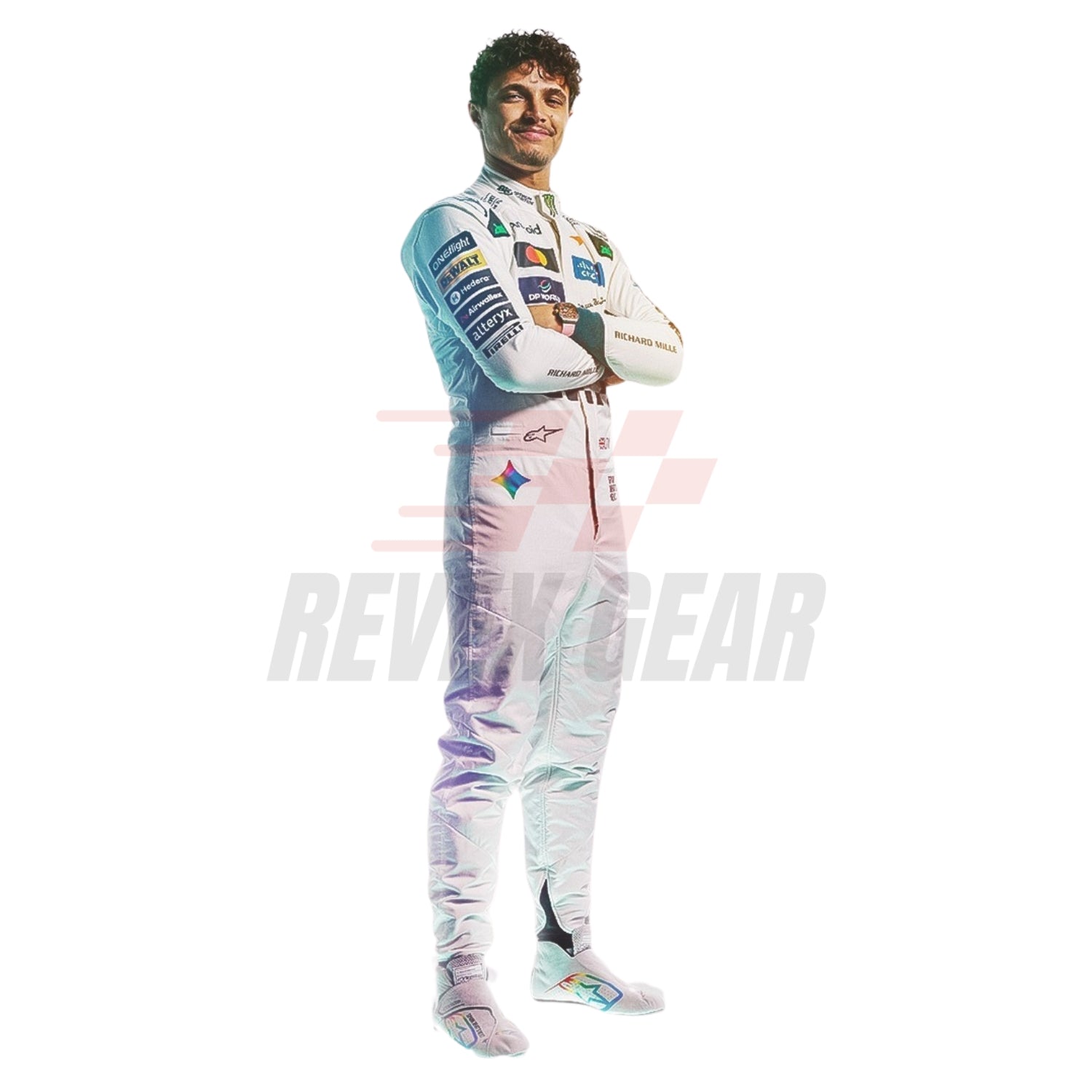 A full-body studio photo of Lando Norris wearing a white McLaren 2026 British GP F1 racing suit with multiple sponsor logos and colorful patches, standing with arms crossed against a plain white background. A faint REVEX GEAR watermark is visible across the center.