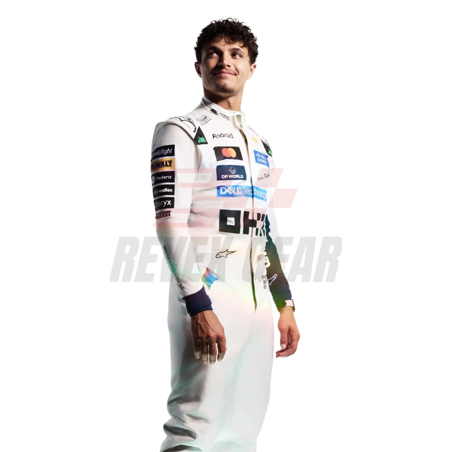 A Lando Norris wearing a white McLaren 2026 British GP F1 racing suit with multiple sponsor logos, standing against a plain white background. A large semi-transparent watermark reading 'REVEX GEAR' is overlaid across the center.